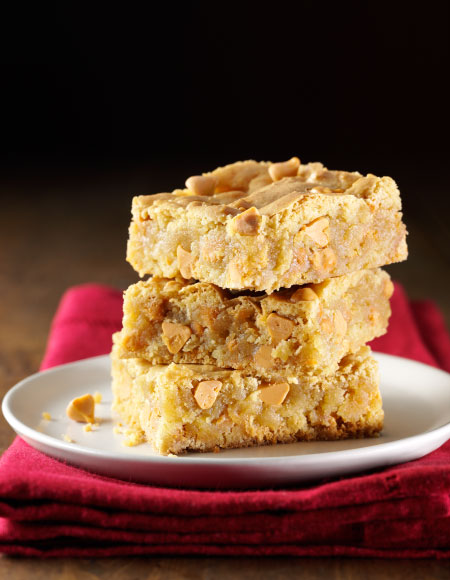Three pieces of Blondies stacked together on a Plate