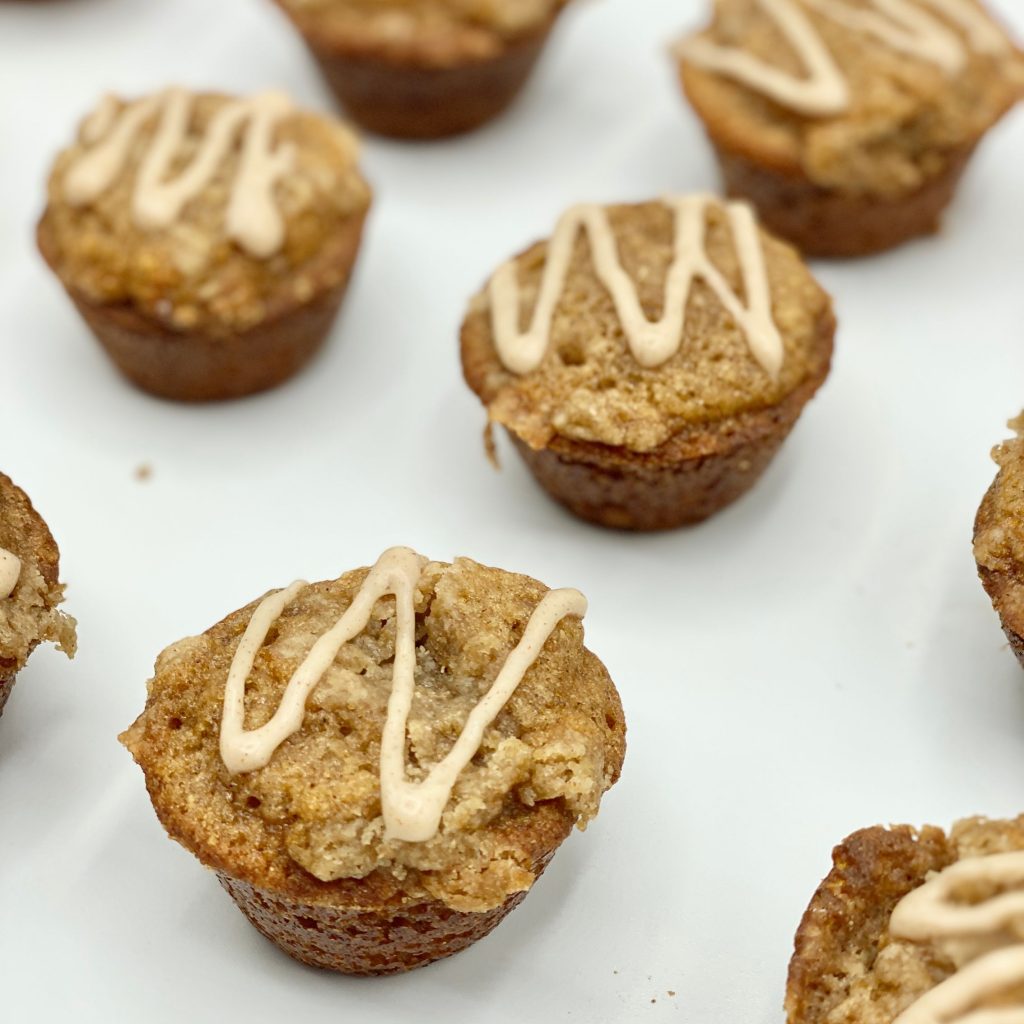 Carrot Cake Crumb Bites With Icing Drizzled on Top