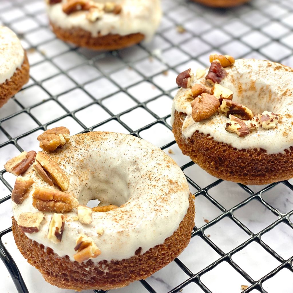 Carrot Cake Doughnuts With Icing and Nuts
