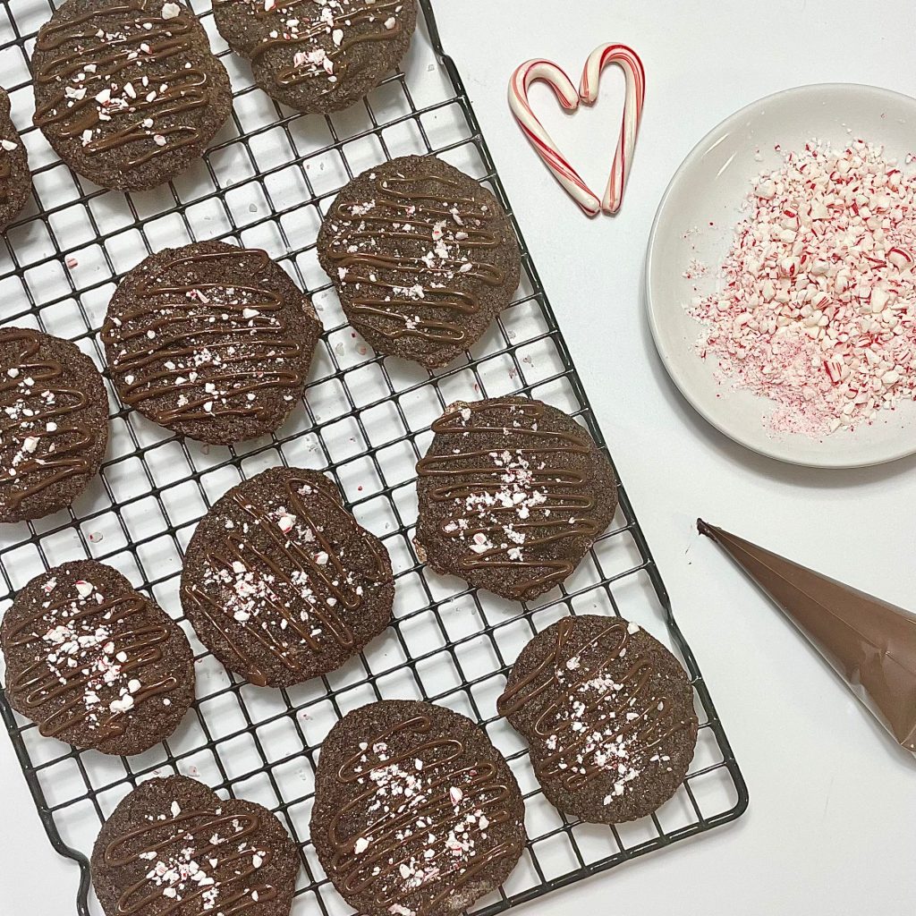 Chocolate Peppermint Cookies With Peppermint on Top on a Net Tray