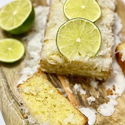 Coconut Lime Load Cake With a Slice on Side