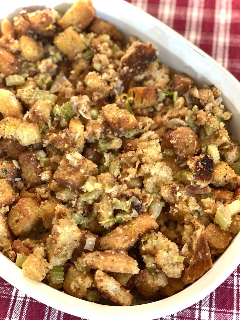 Corn Bread Stuffing in a White Bowl Top Shot
