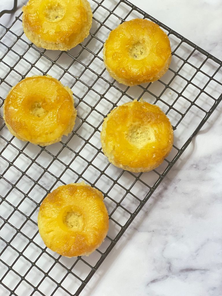 Pineapple Upside Down Doughnuts on a Baking Net