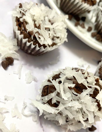 Fudge Brownie cupcakes topped with coconut flakes