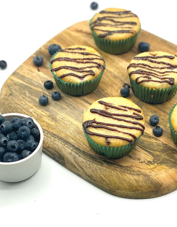 Pound Cake Muffins With Blueberries and Chocolate Drizzle