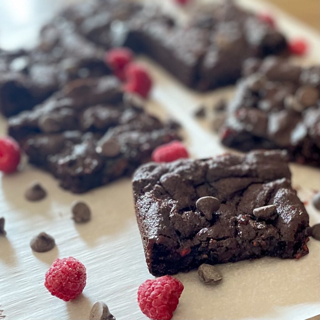 Double Chocolate Raspberry Cookie Bar on Wooden Surface