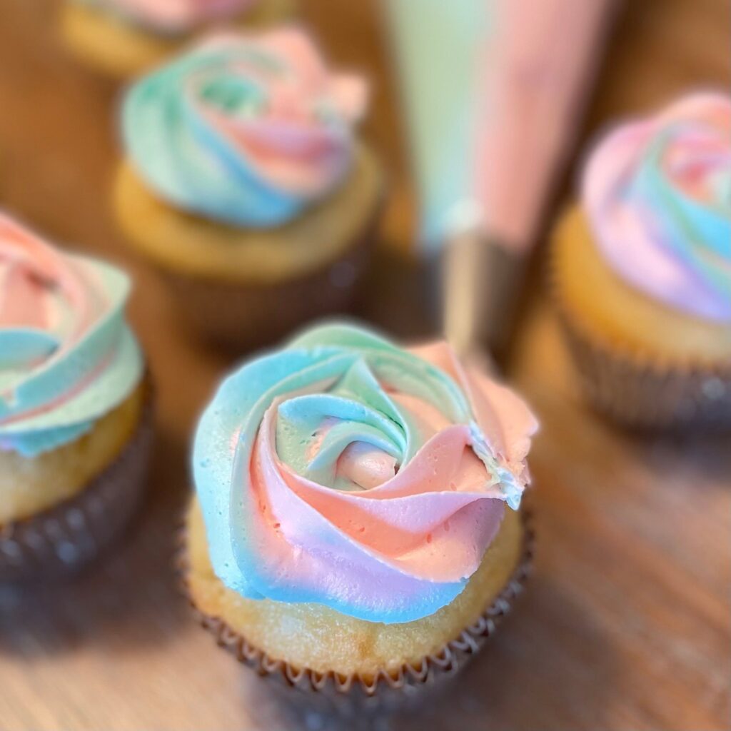 Cupcakes with Multicolor Frosting on Display