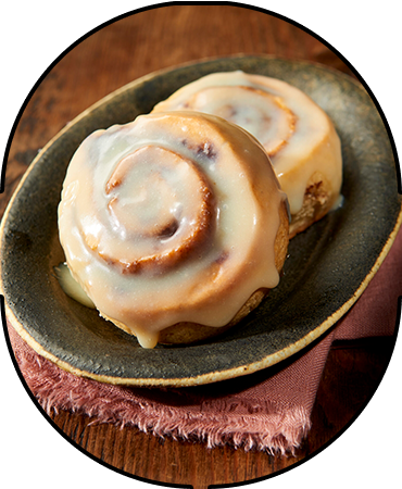 Two Cinnamon Buns on a Platter For Display